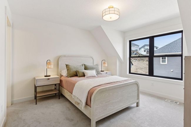 Upper level bedroom #4 with en-suite 3/4 bath. | Image 17