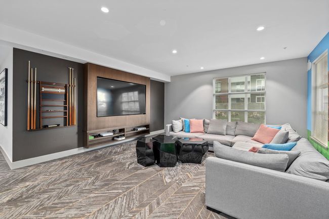 Living area featuring recessed lighting and baseboards | Image 39