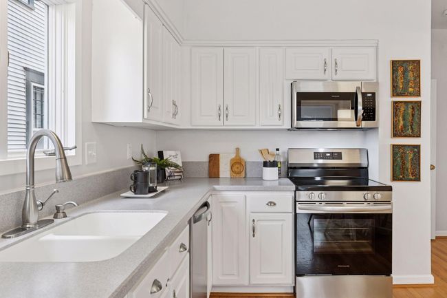 Expanses of countertops offer plenty of workspace for creating your favotie recipes. | Image 18