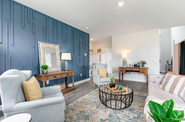 Living room with wood finished floors and recessed lighting | Image 10