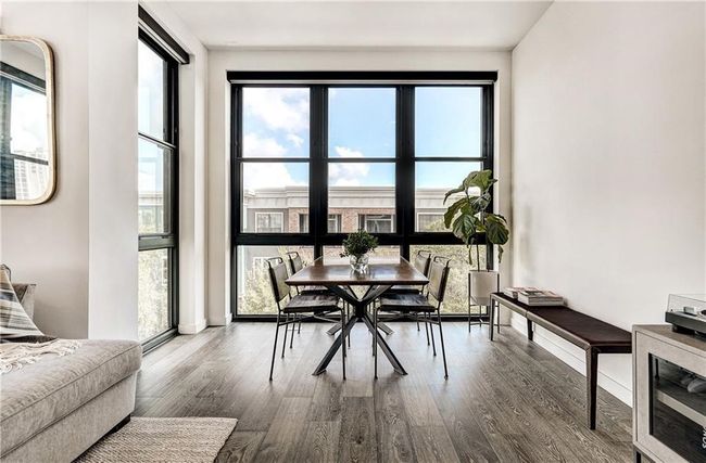 Take in the skyline views while enjoying meals in the initimate dining space. | Image 12
