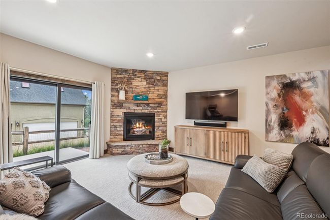 Basement Family Room - Gas fireplace and walk-out with fence | Image 37