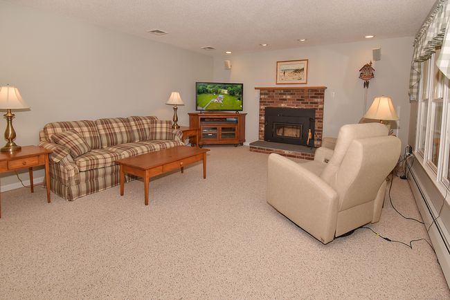 Family room with cozy wood burning fireplace | Image 15