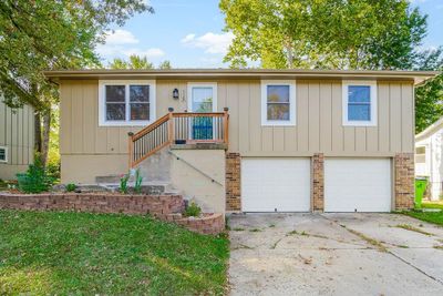 View of front of home with a garage | Image 1