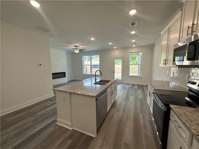 UNIT-115 - 5605 Overview Dr, Townhouse with 3 bedrooms, 3 bathrooms and null parking in Flowery Branch GA | Image 4