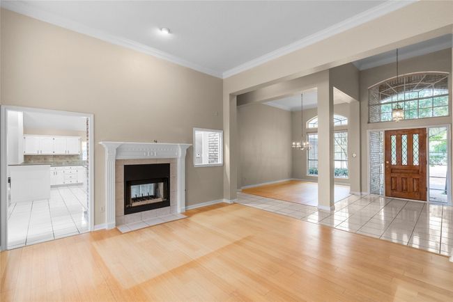 See through gas fireplace from Living room to Kitchen | Image 10