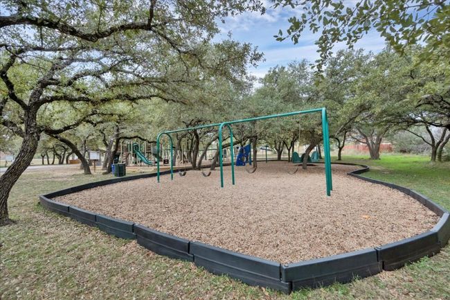 There is a large playground with excellent shade. | Image 11