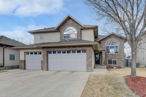 9010 Lakeshore Drive, Home with 4 bedrooms, 3 bathrooms and 8 parking in Grande Prairie AB | Card Image