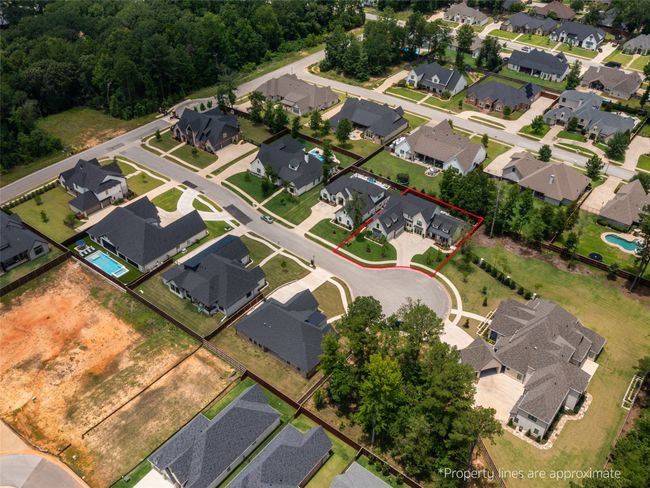 Aerial perspective of suburban area featuring property boundaries highlighted | Image 4