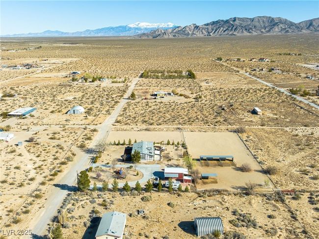 Birds eye view of property featuring view of desert, a rural view, and a mountain view | Image 86