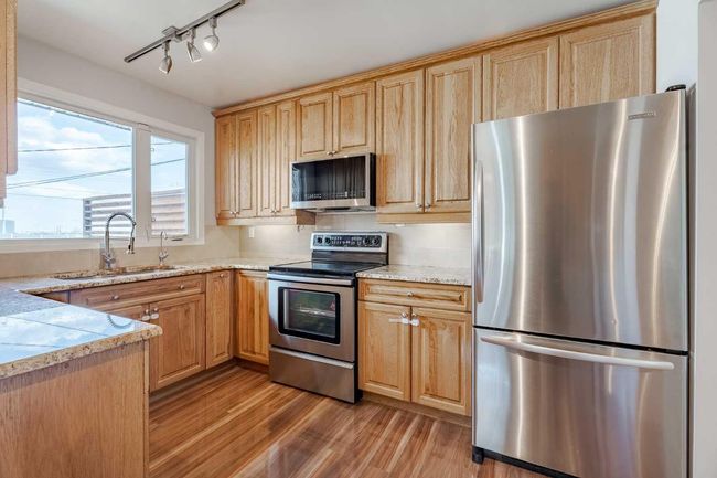 8408 Addison Dr Se, House other with 4 bedrooms, 2 bathrooms and 3 parking in Calgary AB | Image 10