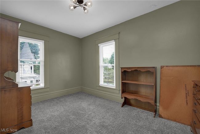 Bedroom with carpet | Image 16