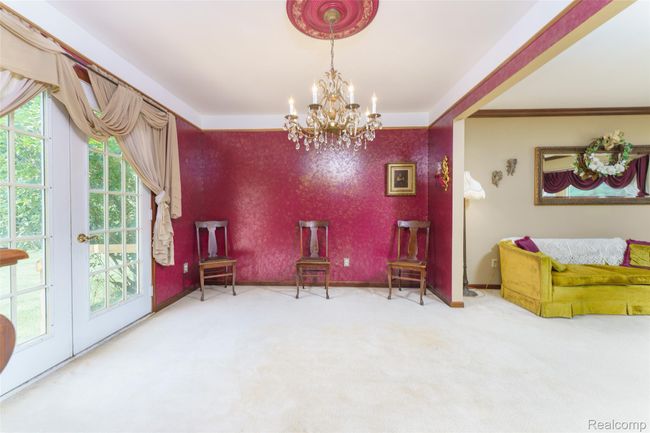 Dining room with chandelier | Image 8