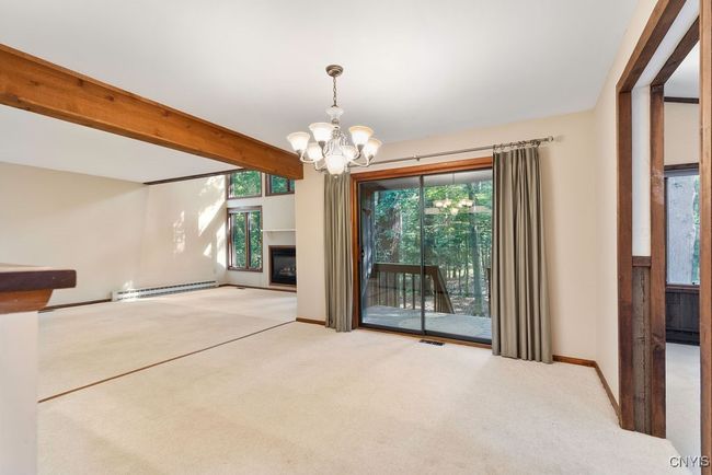 Stairs leading to second floor are just off the family room! | Image 19