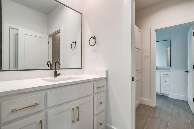 Bathroom featuring vanity | Image 31