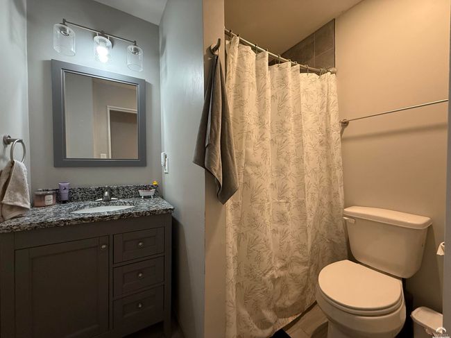 3/4 bathroom was created from extra space in the primary bathroom It is contemporary and super cute! | Image 32