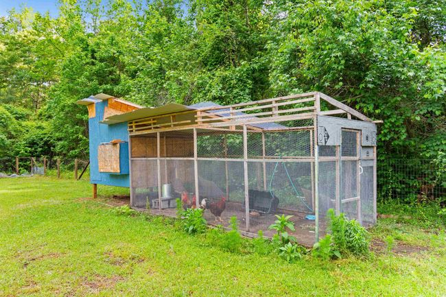View of poultry coop with a lawn | Image 29