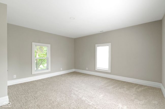 carpeted empty room with baseboards | Image 31