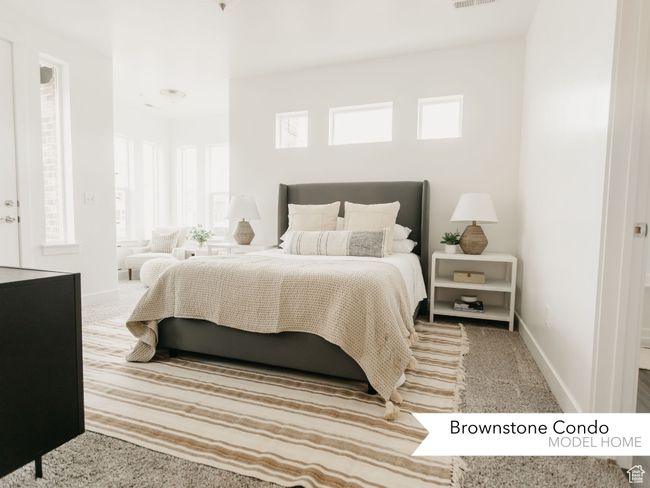 Bedroom with carpet floors, visible vents, and baseboards | Image 14