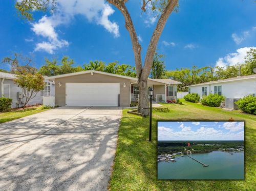 317 Water Landing Dr, OAK HILL, FL, 32759-9566 | Card Image
