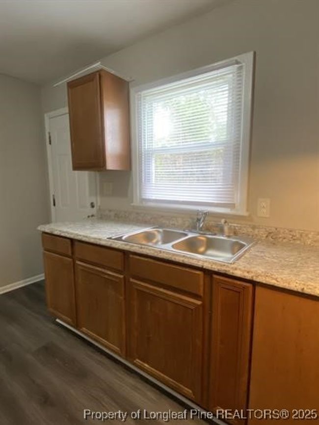 B - 703 Lake Ave, Condo with 2 bedrooms, 1 bathrooms and null parking in Spring Lake NC | Image 4