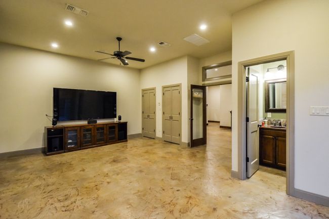 2nd living area with 1/2 bath. Great tv room with pool access. | Image 18