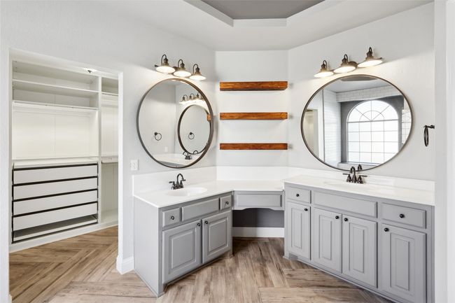 Bathroom featuring vanity and parquet flooring | Image 18