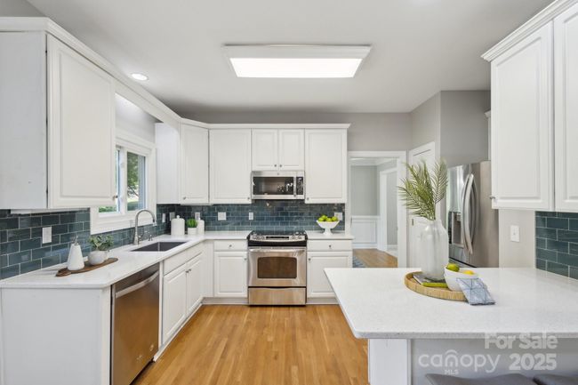 Kitchen looking toward dining room | Image 8