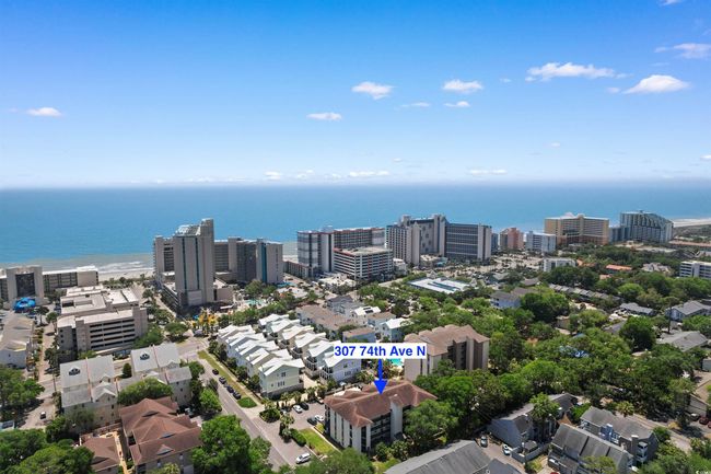View of urban area featuring a large body of water | Image 32