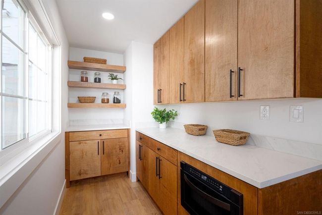 Hidden pantry area with in cabinet drawer Microwave | Image 17
