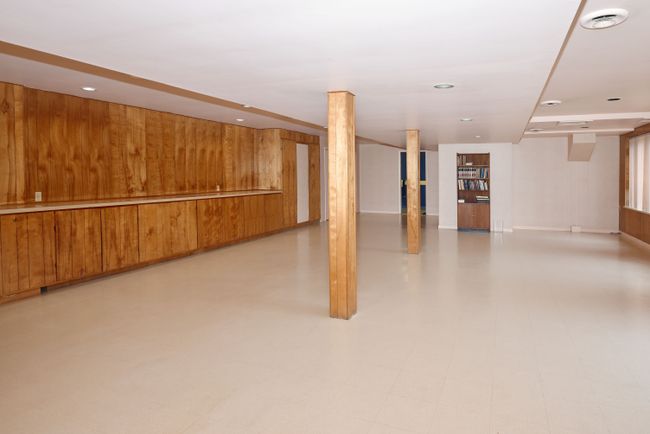 2nd view of lower level w/built-in storage | Image 34