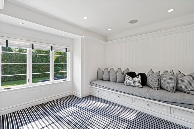 Office featuring beam ceiling, plenty of natural light, and coffered ceiling | Image 13