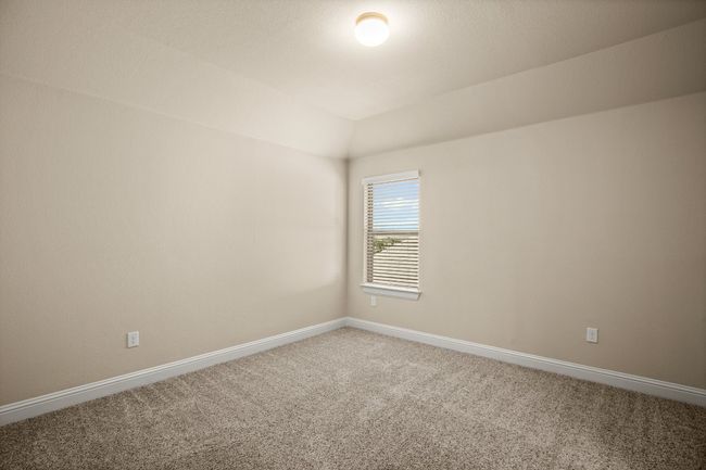 Spare room featuring light carpet and baseboards | Image 21
