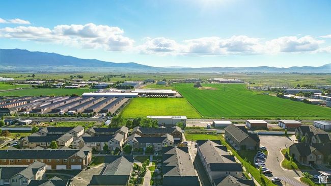 Aerial perspective of suburban area featuring a mountain backdrop | Image 36