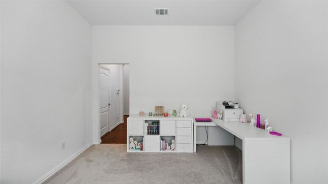Carpeted office space with baseboards | Image 31