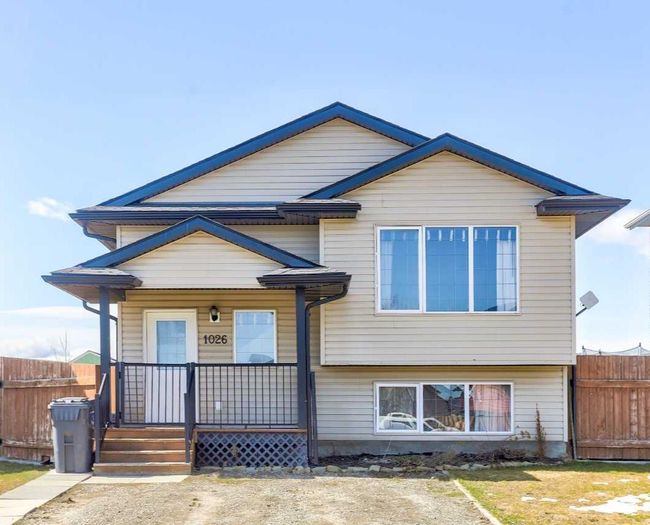 1026 Livingston Way, Home with 4 bedrooms, 2 bathrooms and 2 parking in Pincher Creek AB | Image 1