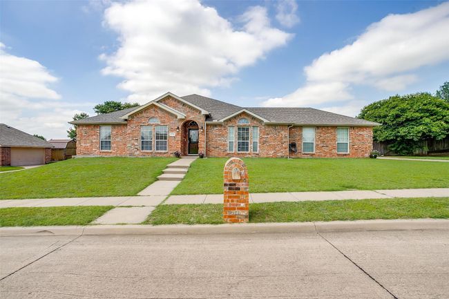 View of front of house with a front yard. | Image 4