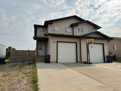 407 6 Th St N, Home with 4 bedrooms, 3 bathrooms and 5 parking in Marwayne AB | Image 2