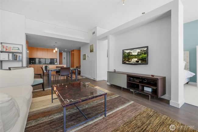 Open floor plan with living/dining area and modern kitchen | Image 12