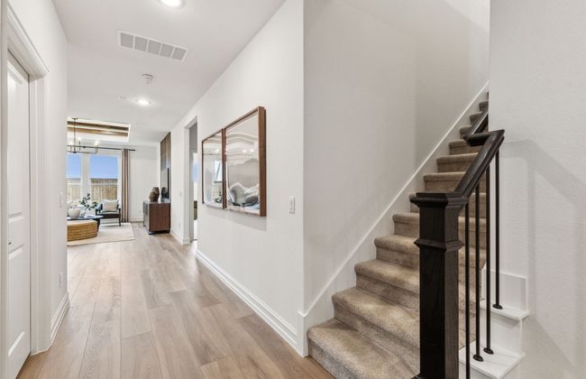 Welcoming entry *Photos of furnished model. Not actual home. Representative of floor plan. Some options and features may vary | Image 4
