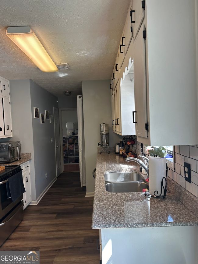 517 Pebble Point Dr, House other with 4 bedrooms, 2 bathrooms and null parking in Loganville GA | Image 9
