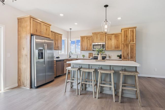 Ample cabinet & counter space, and a full height pantry! | Image 7