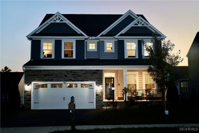 Craftsman-style home with a porch and a garage | Image 3