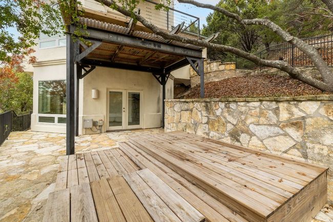 Wonderful Patio area out side of downstairs room. | Image 23