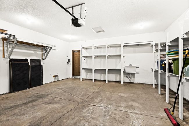 Garage also features a utility sink... you know, because messes happen! | Image 33