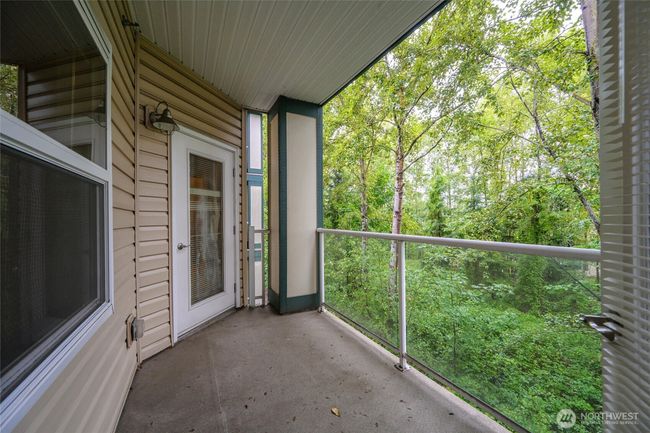 Deck facing peaceful greenspace | Image 20
