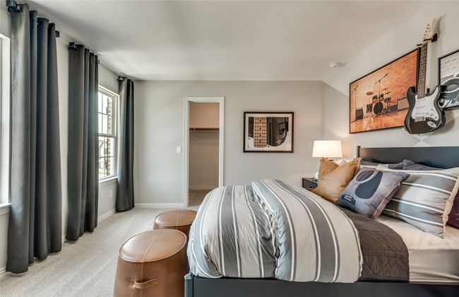Spacious secondary bedroom *Photos of furnished model. Not actual home. Representative of floor plan. Some options and features may vary | Image 19