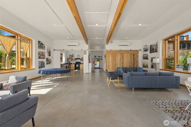The community center is thoughtfully equipped with a full kitchen, two easily accessible bathrooms, a cozy library, and a selection of indoor and outdoor games. | Image 22