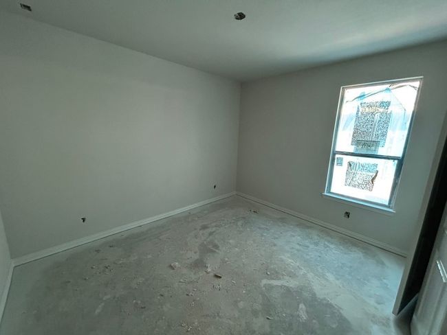 Empty room with concrete floors and baseboards | Image 12
