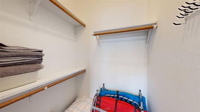 View of spacious closet | Image 23
